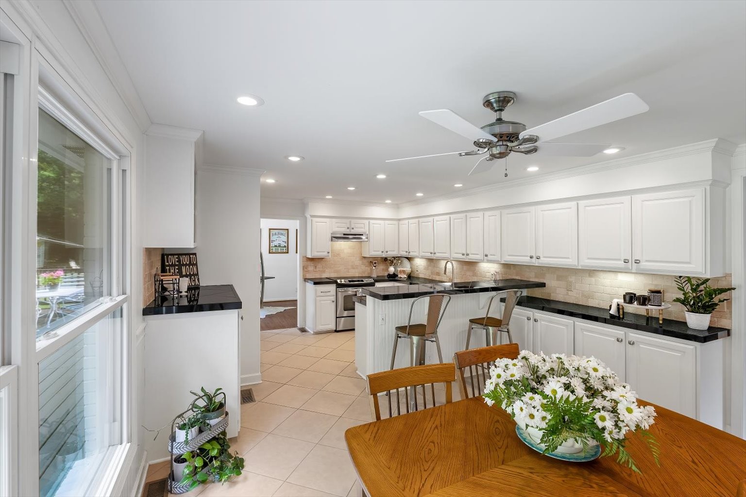 775 High Point Ridge Road Franklin, TN 37069 - Photo 21 of 41 a kitchen with a sink cabinets and stainless steel appliances