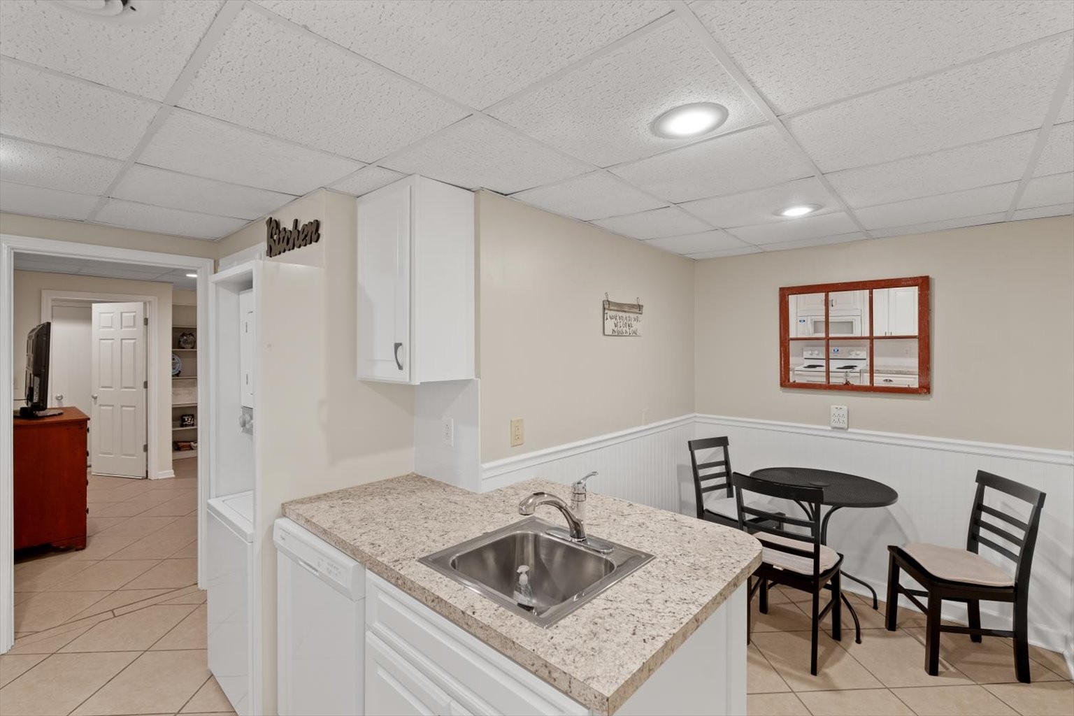 775 High Point Ridge Road Franklin, TN 37069 - Photo 29 of 41 a kitchen with a table chairs and refrigerator