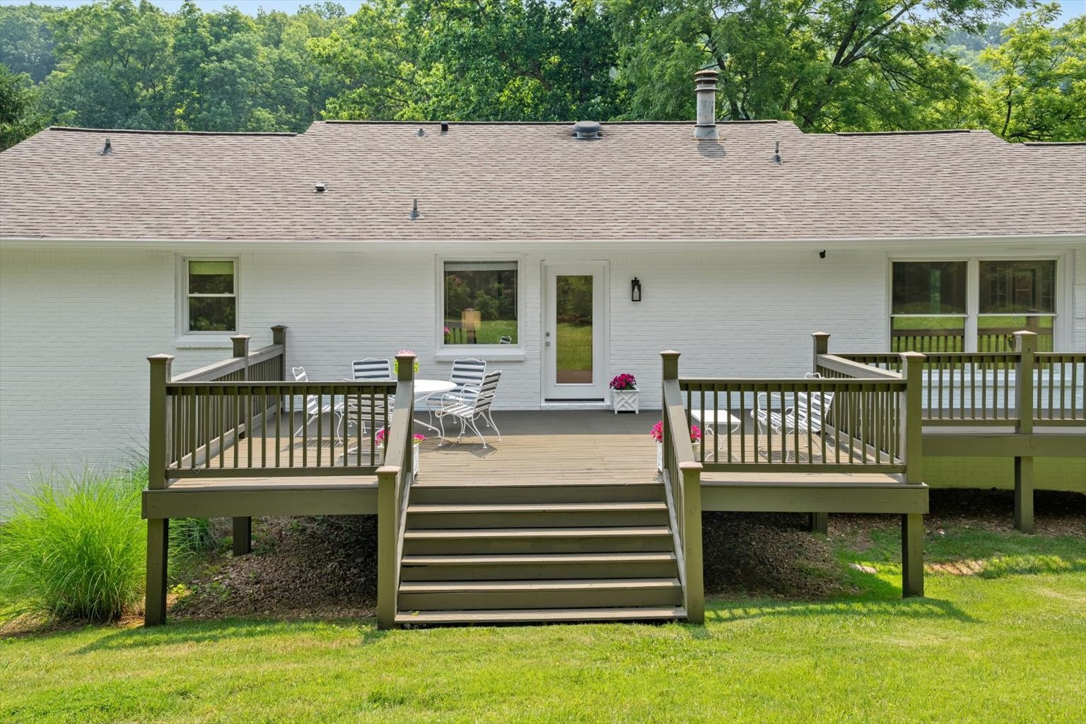 775 High Point Ridge Road Franklin, TN 37069 - Photo 34 of 41 a view of a house with a wooden deck and a yard
