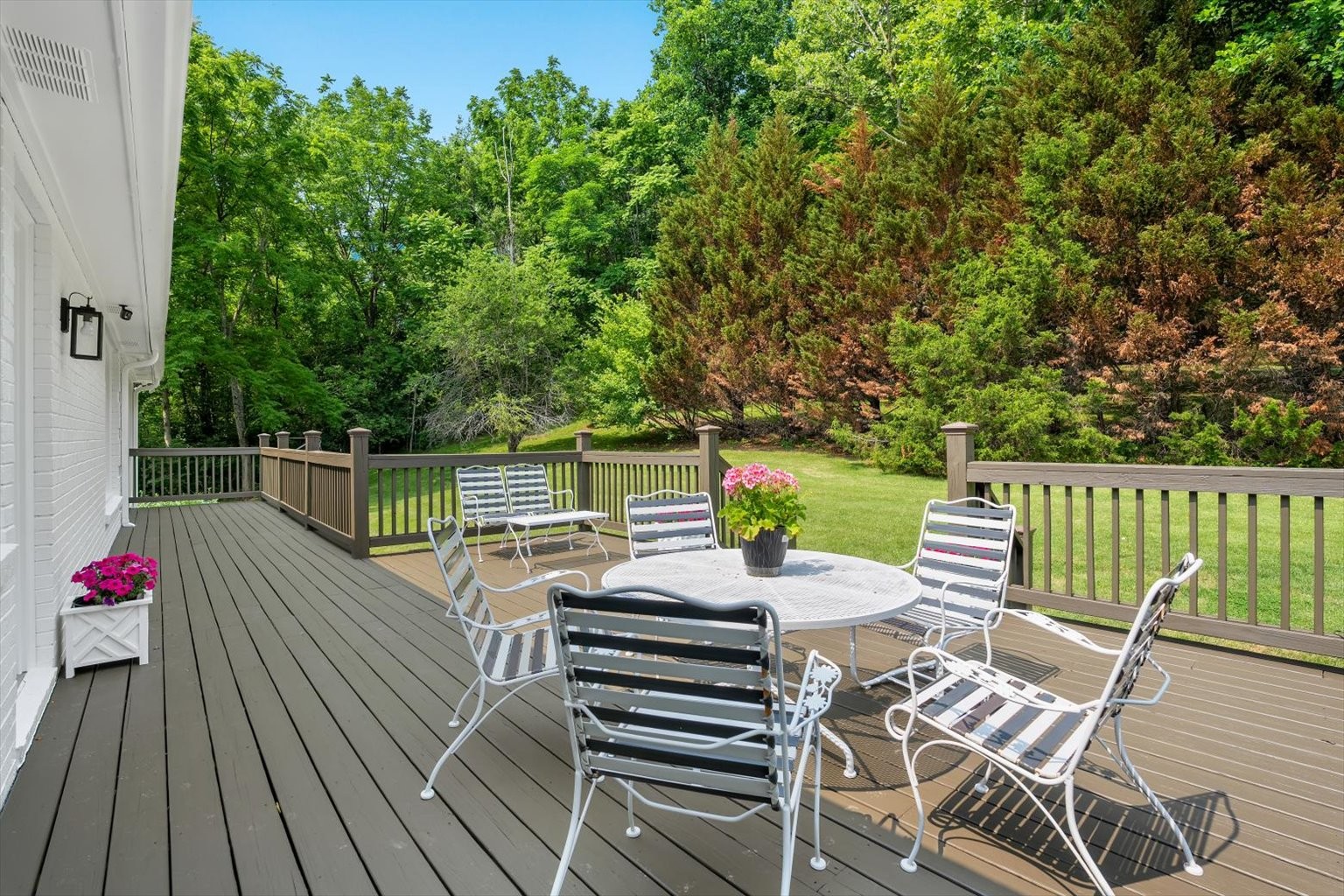 775 High Point Ridge Road Franklin, TN 37069 - Photo 36 of 41 a view of a chairs and table on the wooden deck