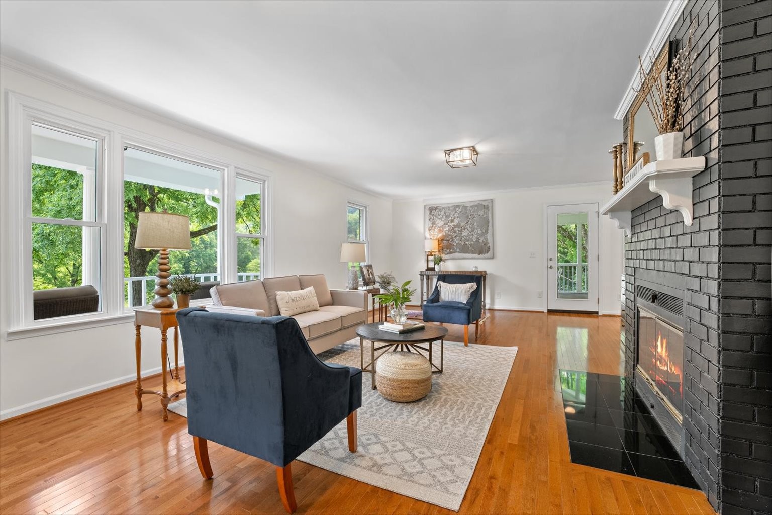 775 High Point Ridge Road Franklin, TN 37069 - Photo 9 of 41 a living room with fireplace furniture and a large window