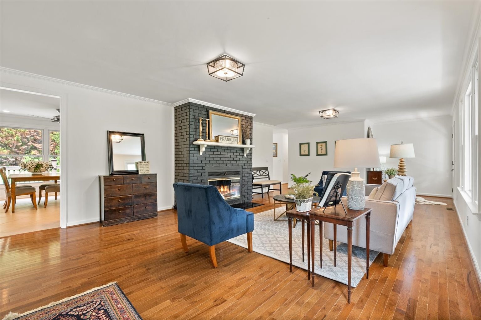 775 High Point Ridge Road Franklin, TN 37069 - Photo 10 of 41 a living room with fireplace furniture and a wooden floor