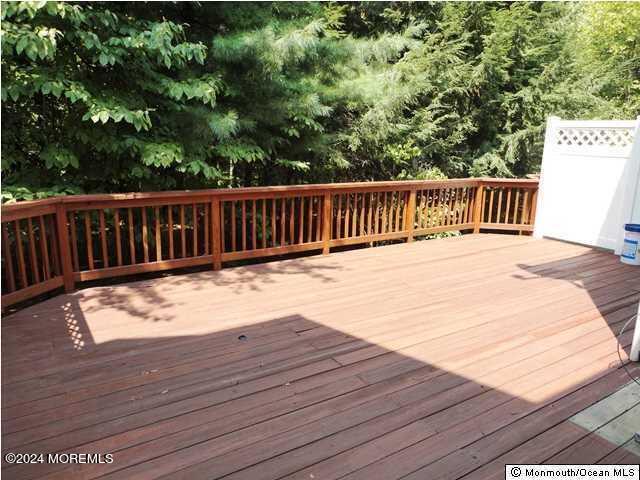 28 Alpine Road, Unit 177 Holmdel, NJ 07733 - Photo 16 of 17 a view of balcony with wooden floor