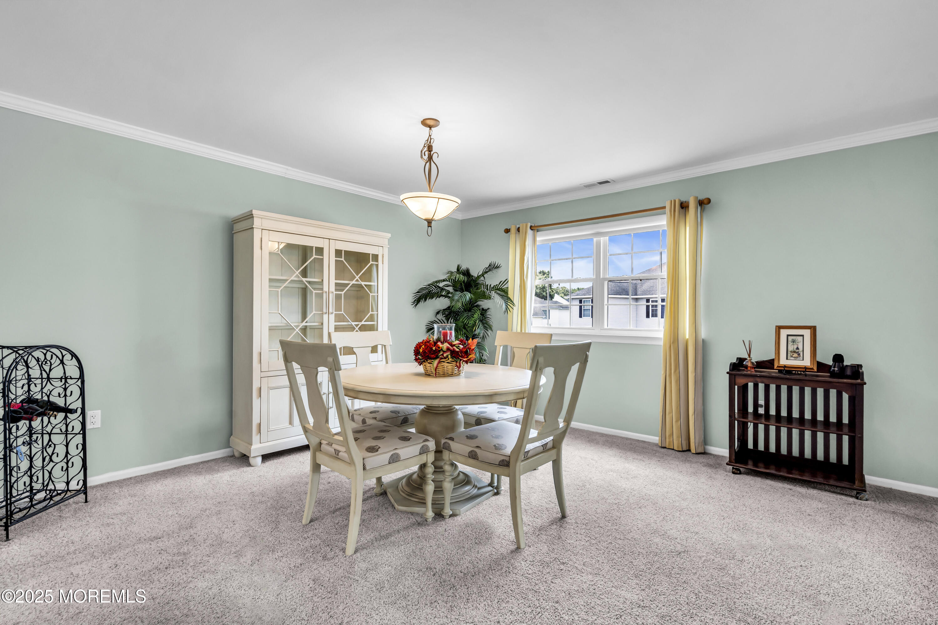 32 Racquet Road Wall, NJ 07719 - Photo 12 of 23 a view of a dining room with furniture window and wooden floor