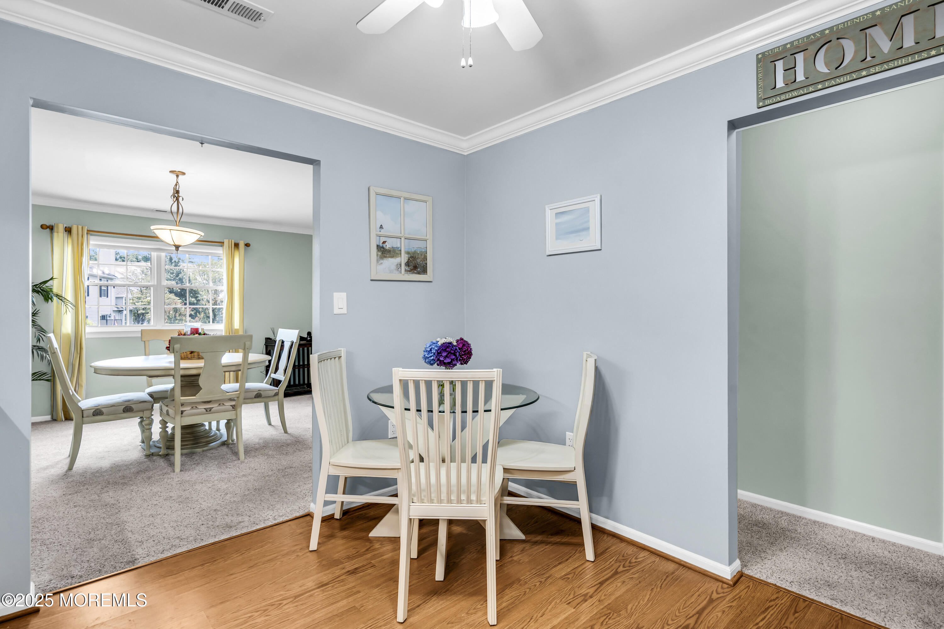 32 Racquet Road Wall, NJ 07719 - Photo 16 of 23 a view of a dining room with furniture and wooden floor