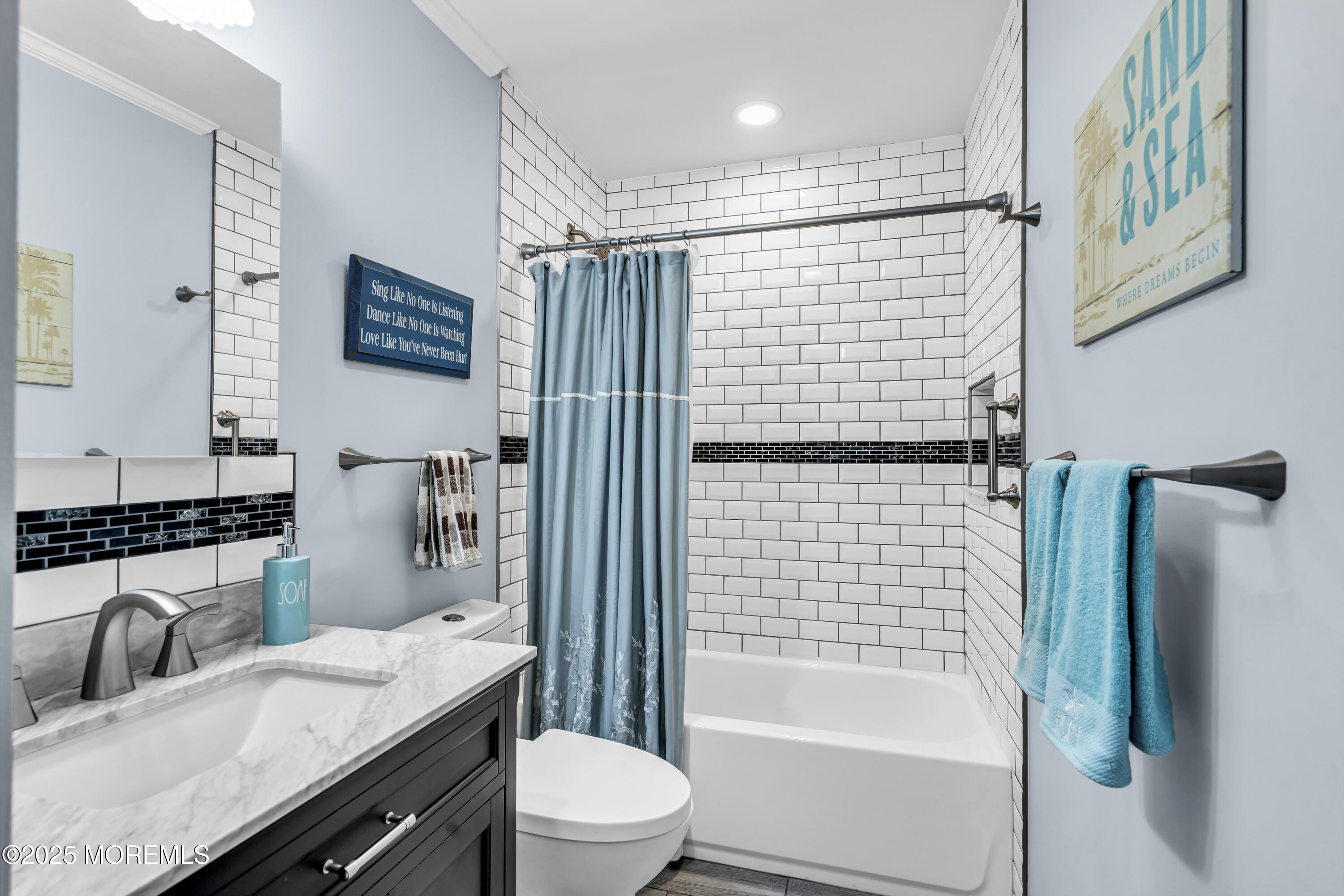 32 Racquet Road Wall, NJ 07719 - Photo 18 of 23 a bathroom with a granite countertop bathtub sink vanity mirror and toilet