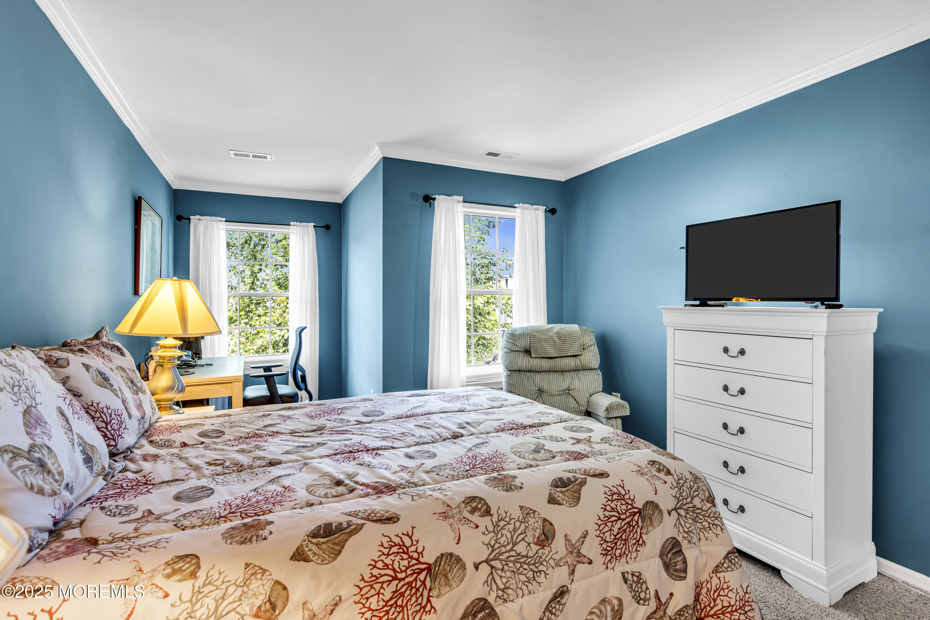 32 Racquet Road Wall, NJ 07719 - Photo 19 of 23 a bedroom with a bed and a flat screen tv