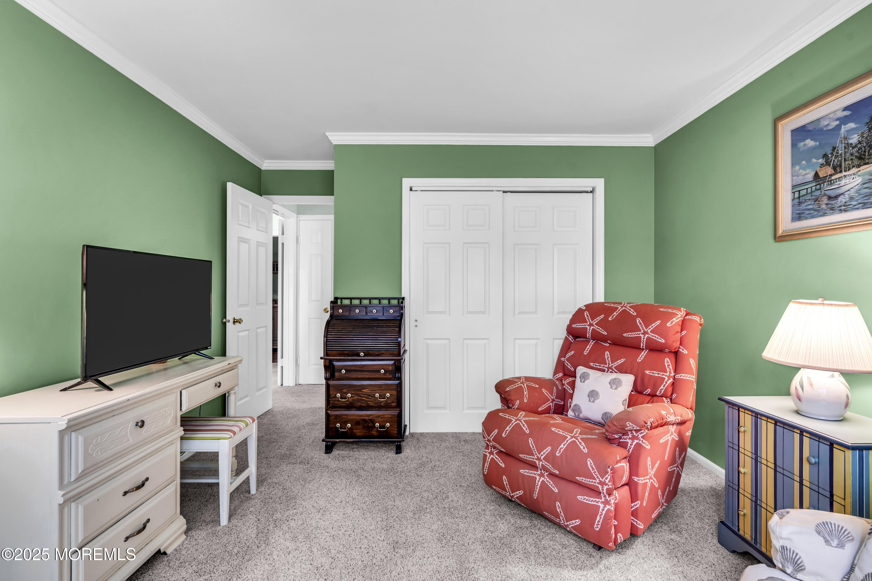 32 Racquet Road Wall, NJ 07719 - Photo 21 of 23 a living room with furniture and a flat screen tv