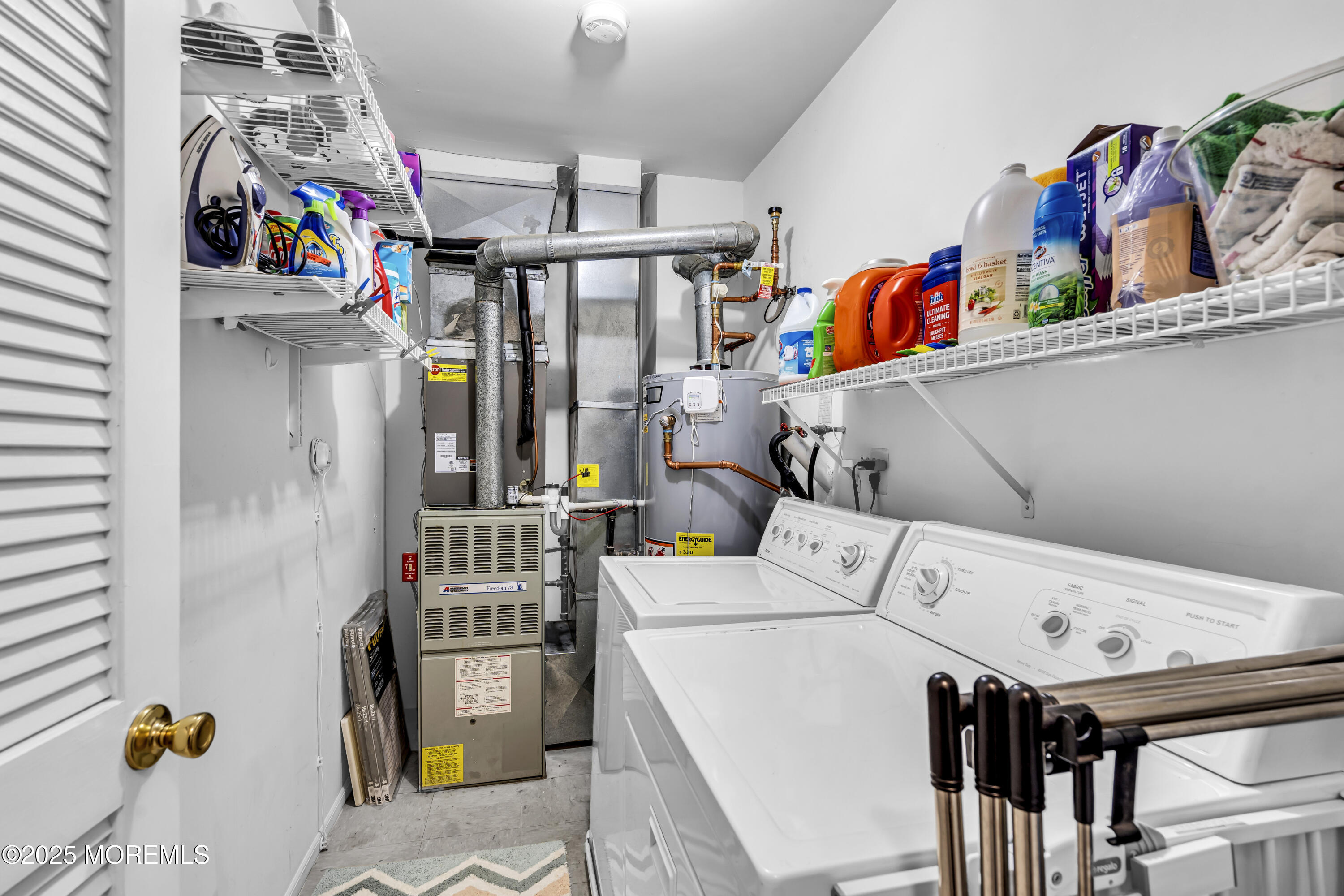 32 Racquet Road Wall, NJ 07719 - Photo 23 of 23 a utility room with dryer and washer
