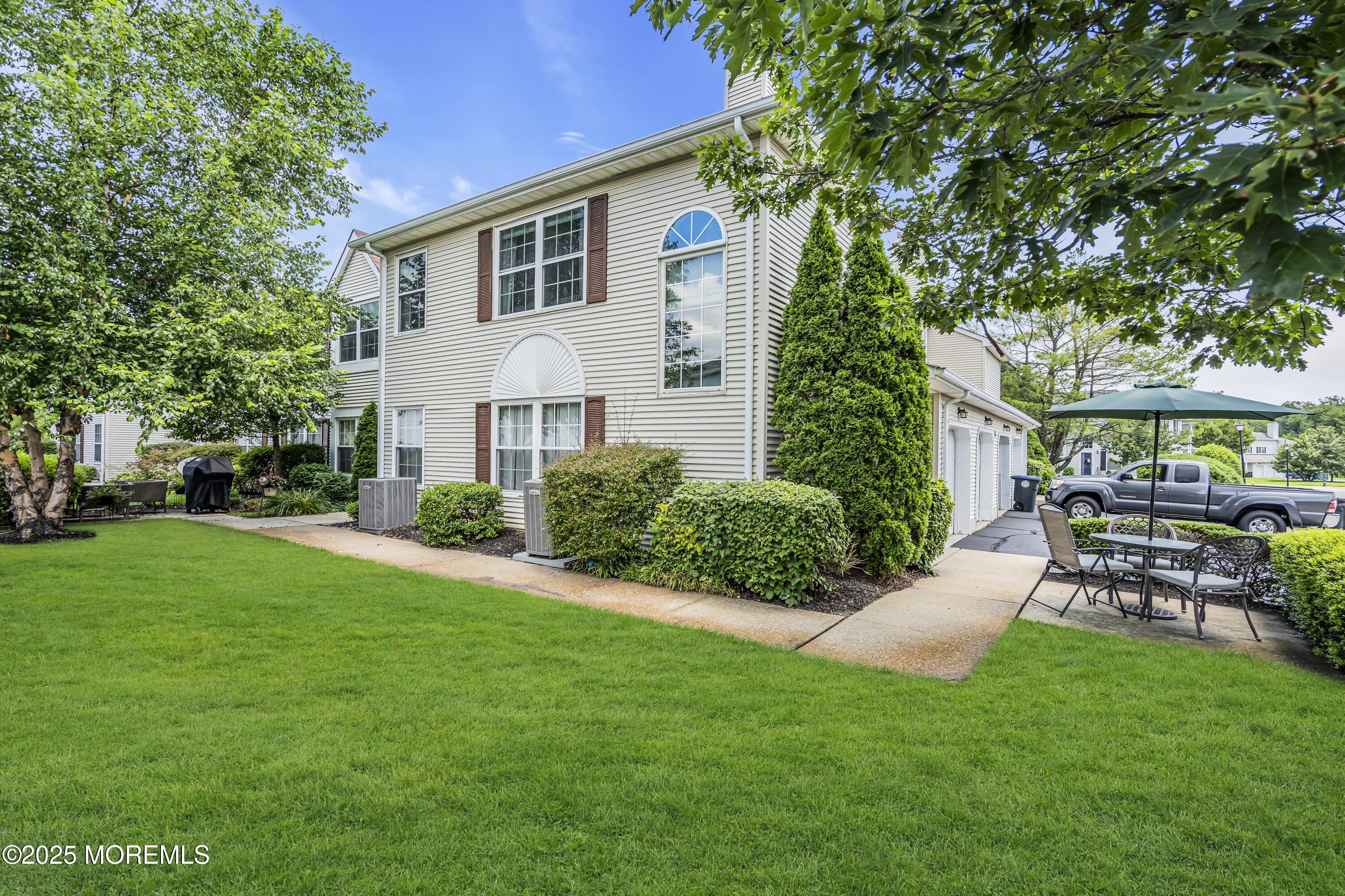 32 Racquet Road Wall, NJ 07719 - Photo 3 of 23 a view of a house with a backyard