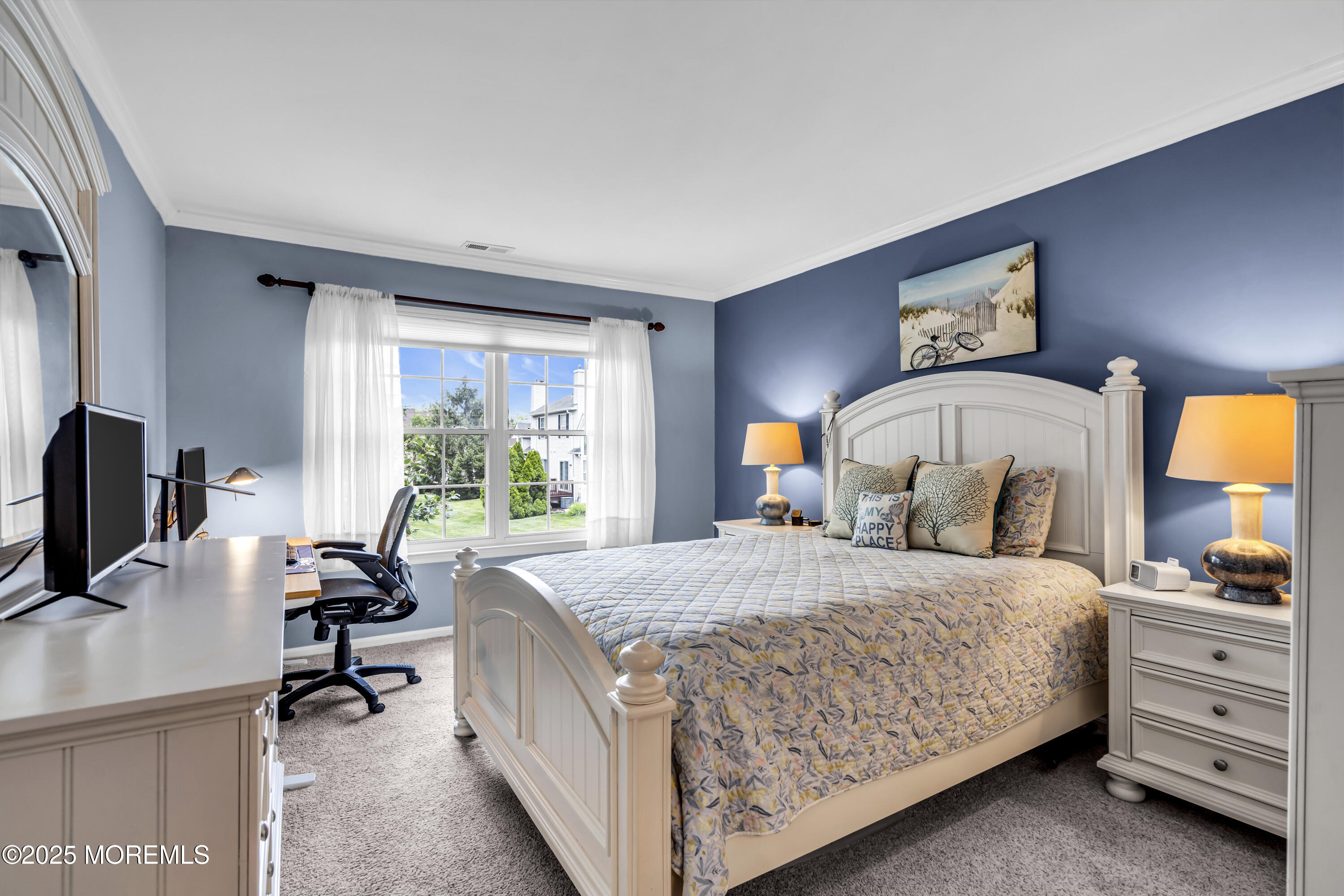 32 Racquet Road Wall, NJ 07719 - Photo 4 of 23 a bedroom with a large bed and a large window