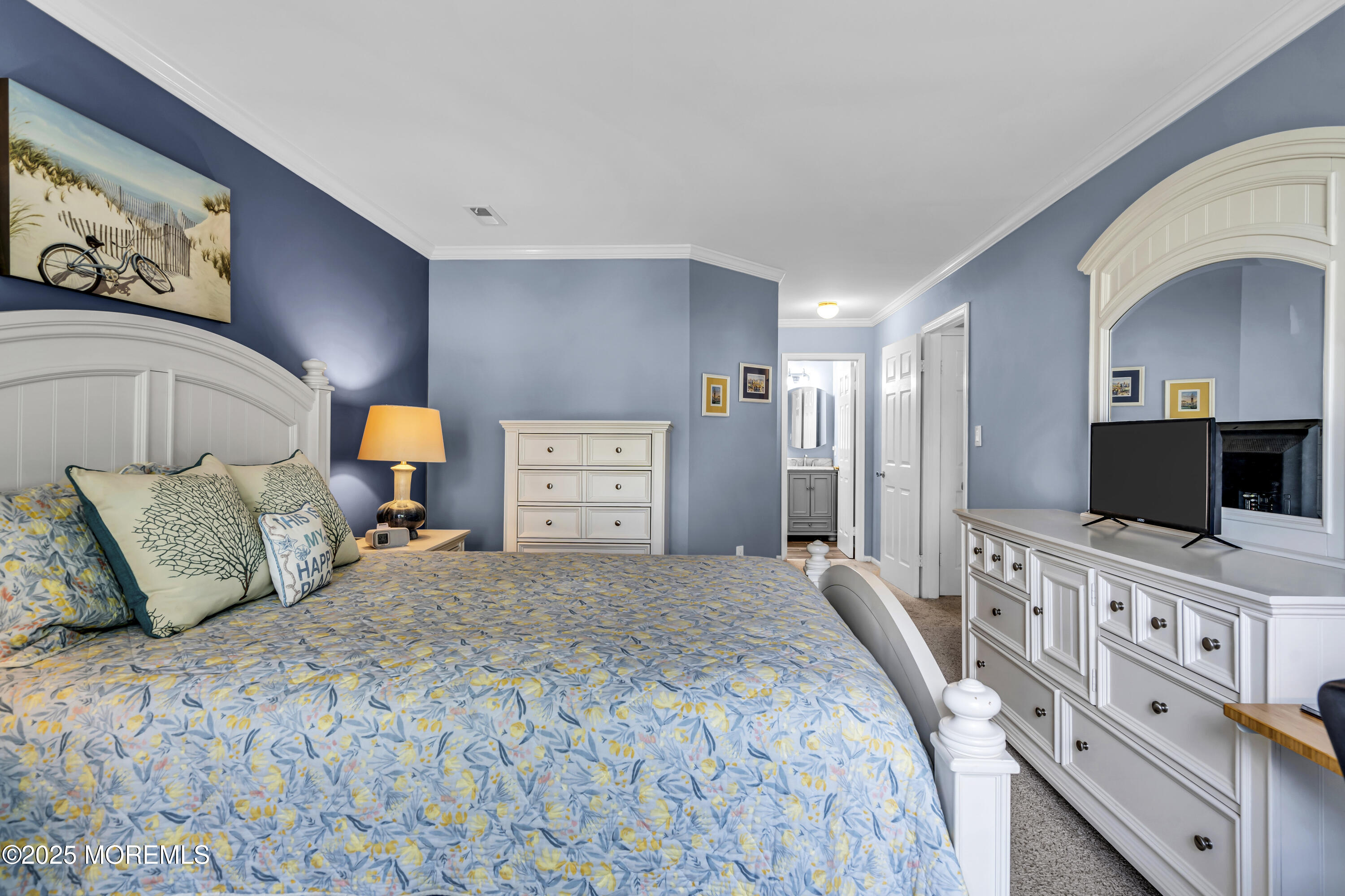 32 Racquet Road Wall, NJ 07719 - Photo 5 of 23 a bedroom with a bed and a flat screen tv