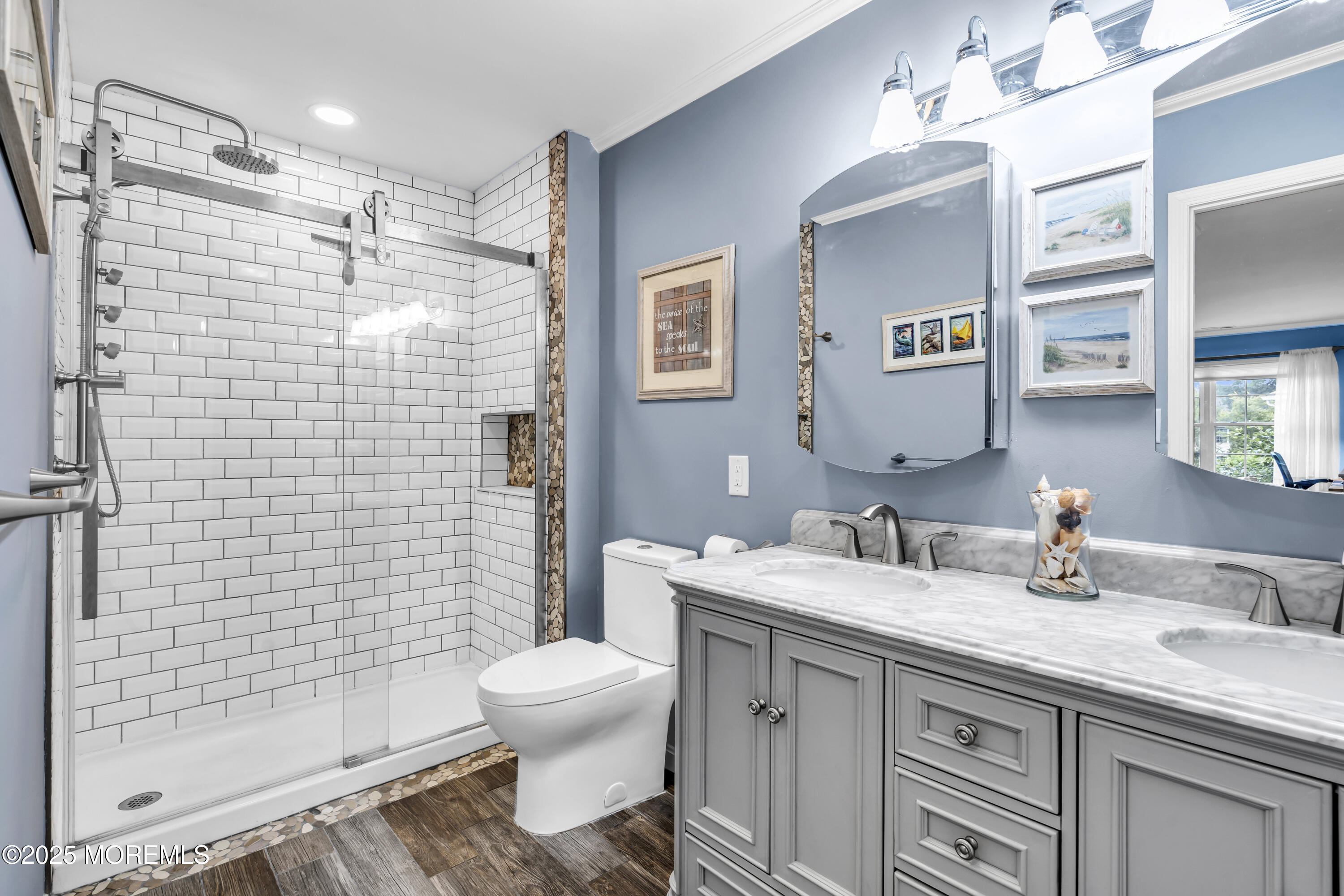 32 Racquet Road Wall, NJ 07719 - Photo 6 of 23 a bathroom with a sink toilet and shower