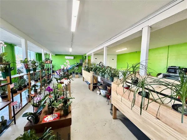 a outdoor space with patio furniture and a potted plant