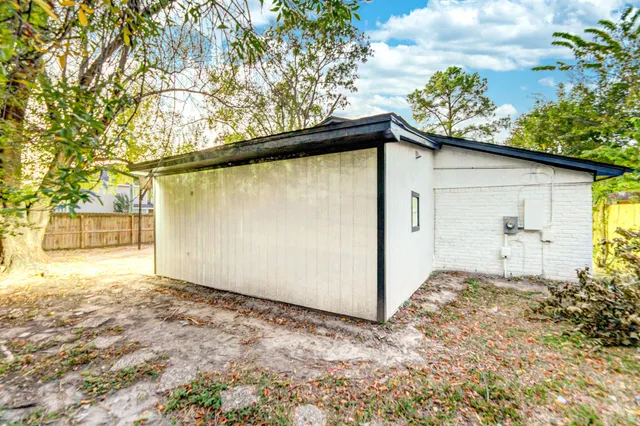 a backyard of a house with lots of green space