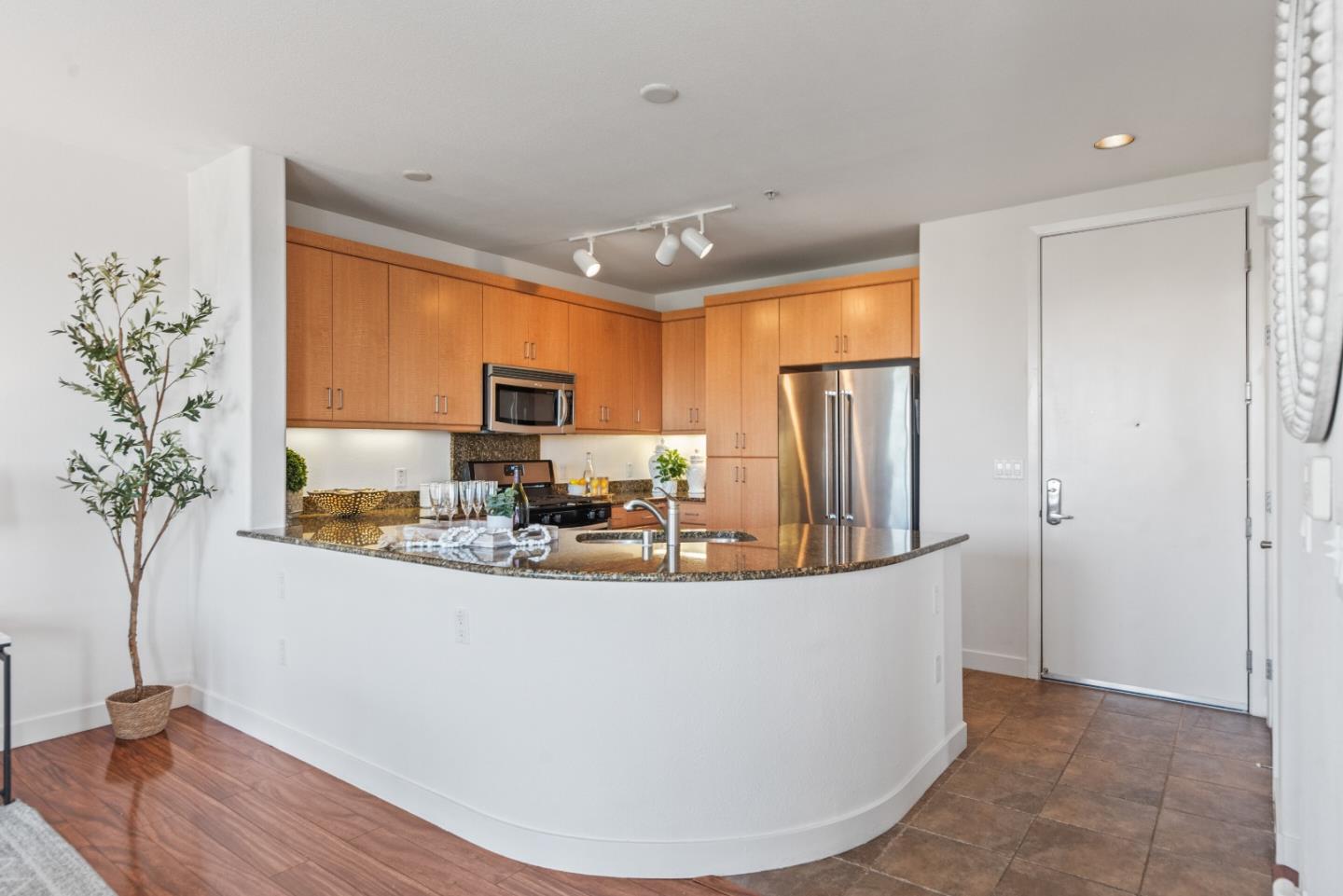 5501 De Marcus Boulevard, Unit 519 Dublin, CA 94568 - Photo 12 of 31 a view of kitchen with stainless steel appliances granite countertop sink and refrigerator