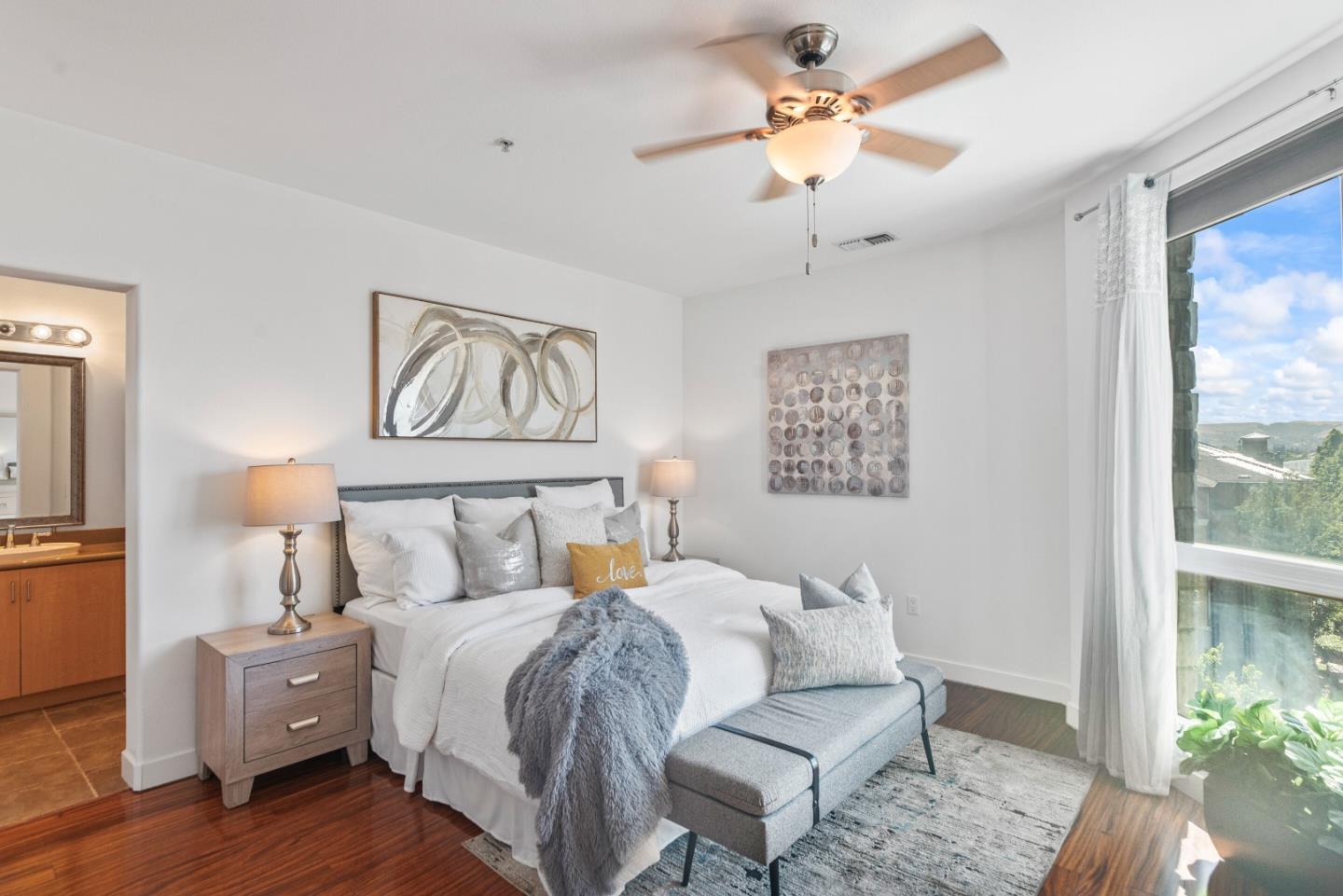 5501 De Marcus Boulevard, Unit 519 Dublin, CA 94568 - Photo 19 of 31 a bed room with a bed and a painting on the wall