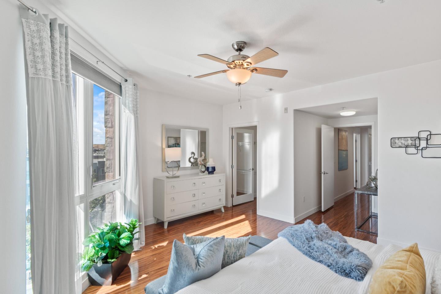 5501 De Marcus Boulevard, Unit 519 Dublin, CA 94568 - Photo 20 of 31 a living room with furniture and a chandelier