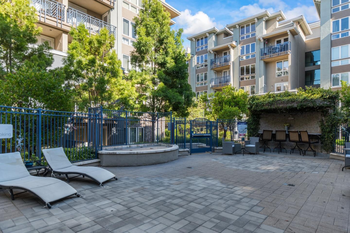 5501 De Marcus Boulevard, Unit 519 Dublin, CA 94568 - Photo 29 of 31 a view of a chair and table in backyard of the house