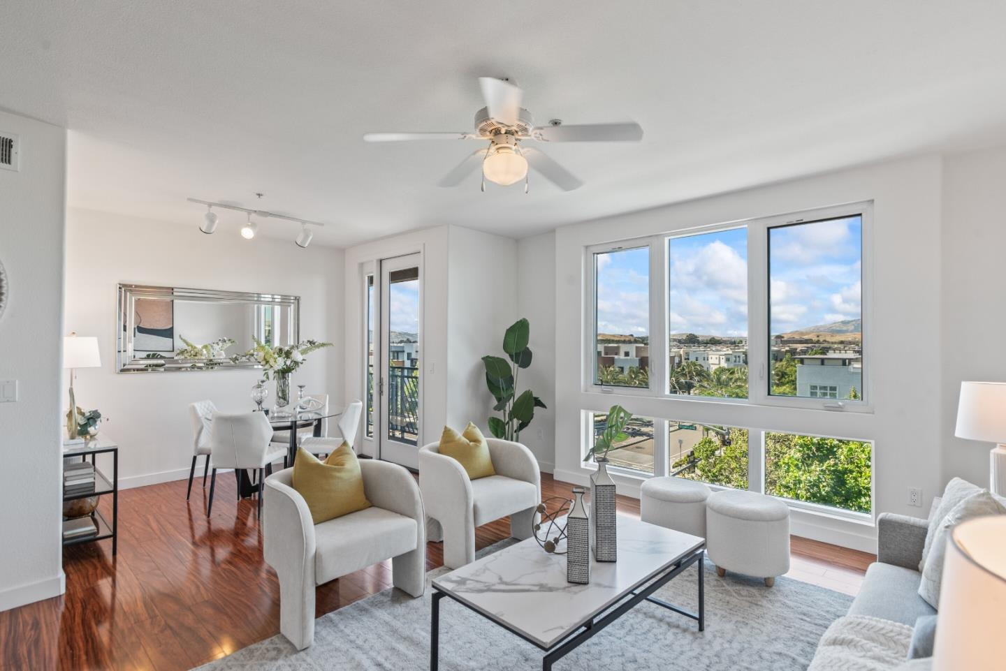 5501 De Marcus Boulevard, Unit 519 Dublin, CA 94568 - Photo 9 of 31 a living room with furniture and a large window
