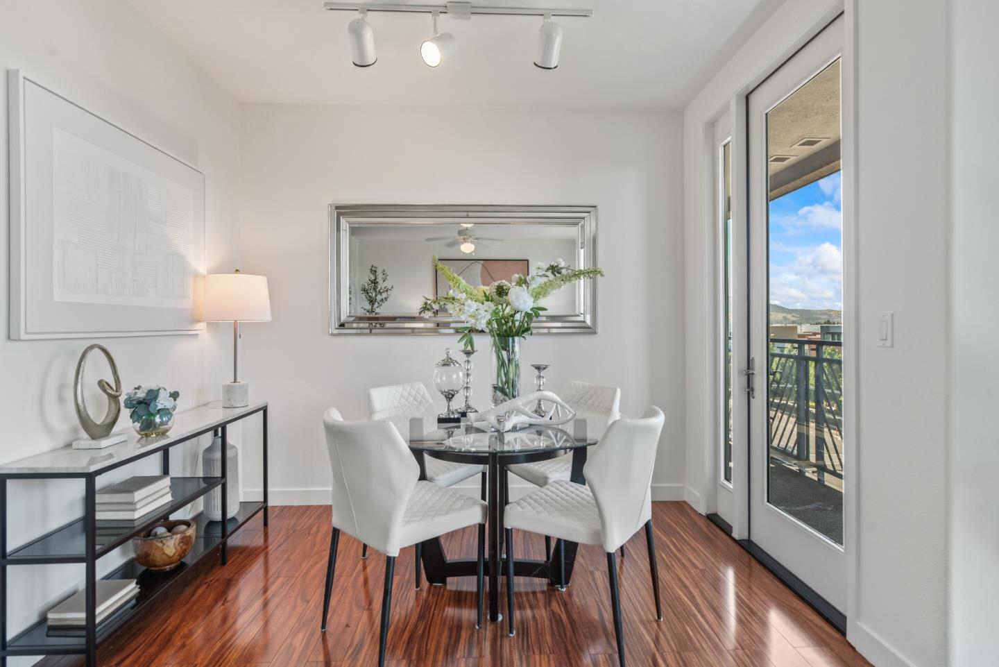 5501 De Marcus Boulevard, Unit 519 Dublin, CA 94568 - Photo 10 of 31 a view of a dining room with furniture and wooden floor