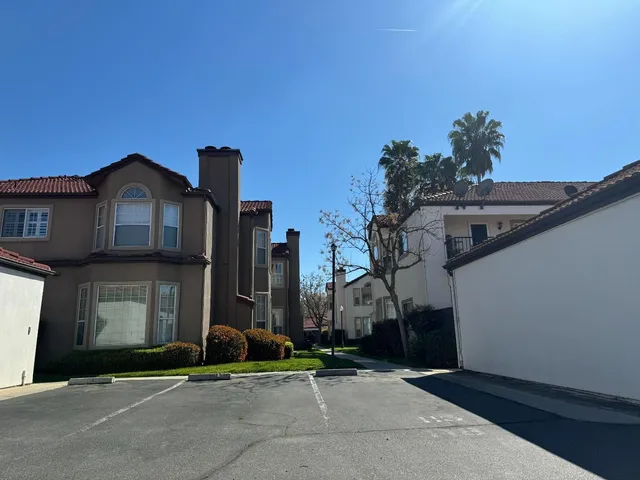 a view of a street with houses