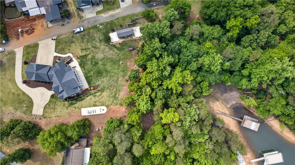 206 James Hare Road Anderson, SC 29626 - Photo 4 of 37 An aerial perspective reveals a private waterfront estate with a substantial home and dedicated boat dock.
