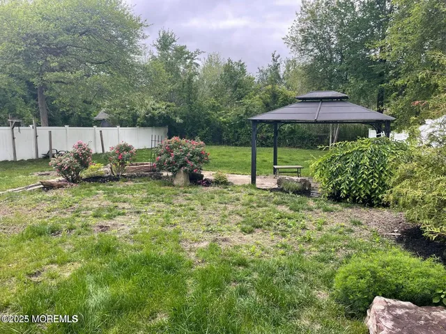 a garden view with a seating space