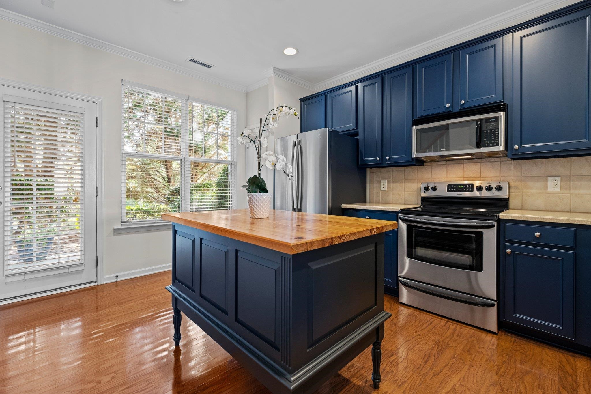Full of sunshine! Large, picturesque windows fill your home with gleaming natural light from sun up to sun down GLEAMING WITH NATURAL LIGHT