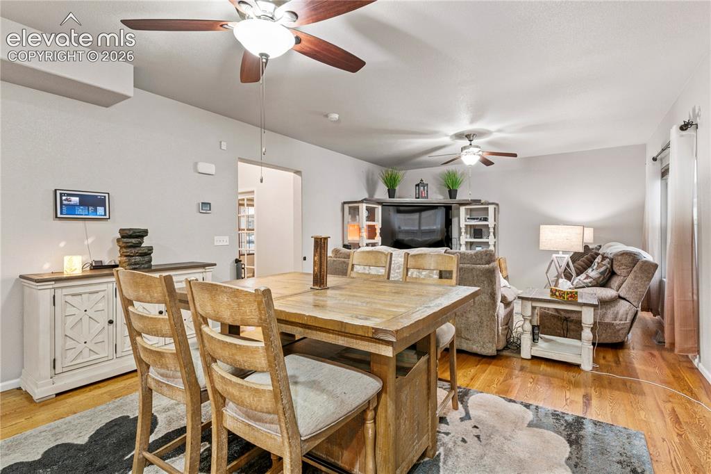 9761 Terrain Road Fountain, CO 80817 - Photo 8 of 31 Kitchen/dining area opens up to the spacious living room
