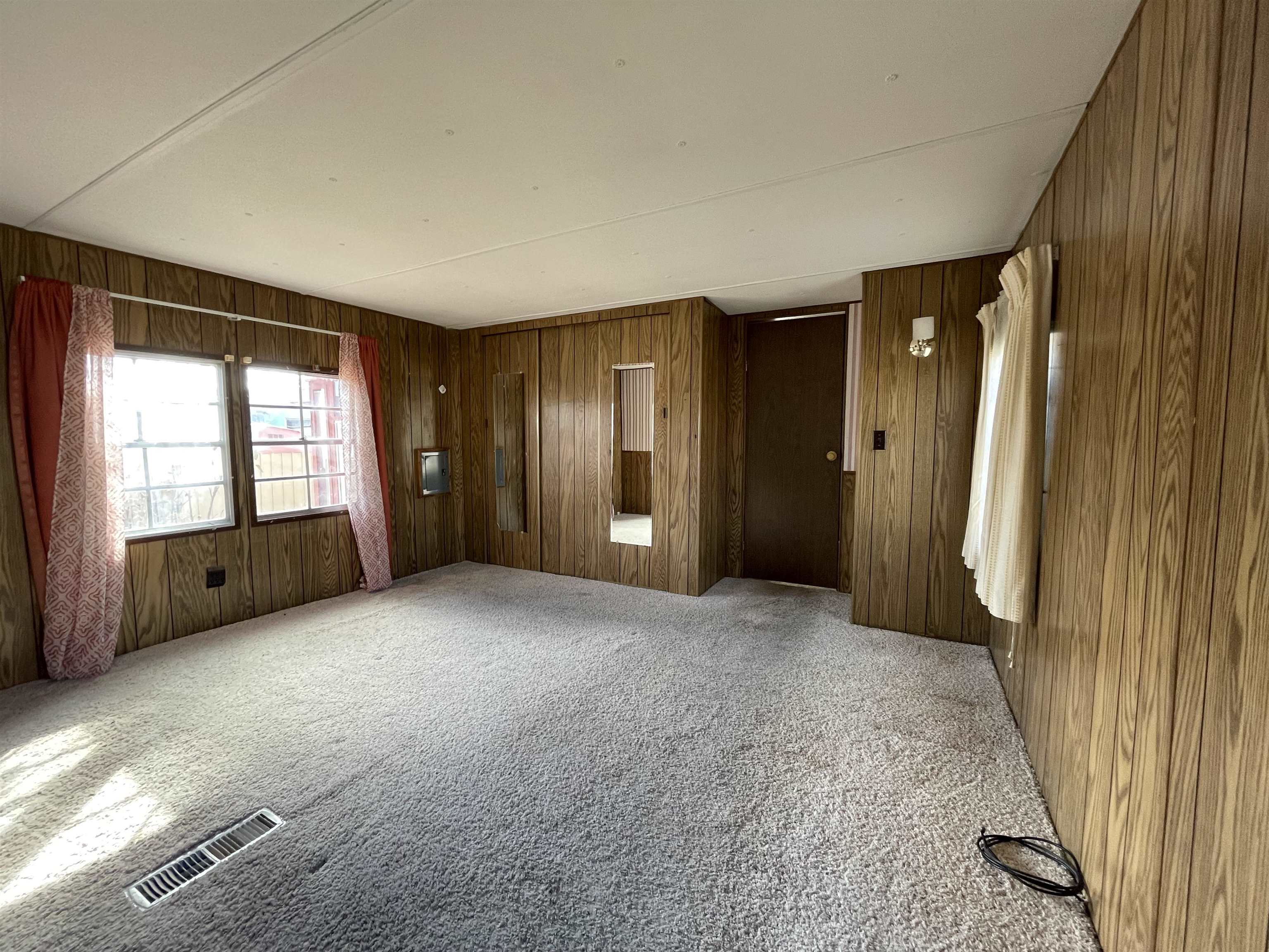 3251 E Road, Unit 102 Clifton, CO 81520 - Photo 6 of 14 a view of an empty room with a window