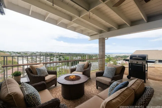 a view of a livingroom with furniture and a window