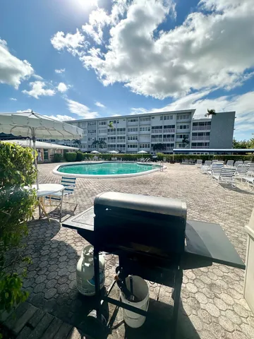 a view of a terrace with sitting area