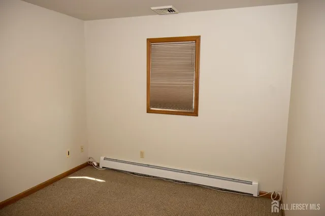 an empty room with a door