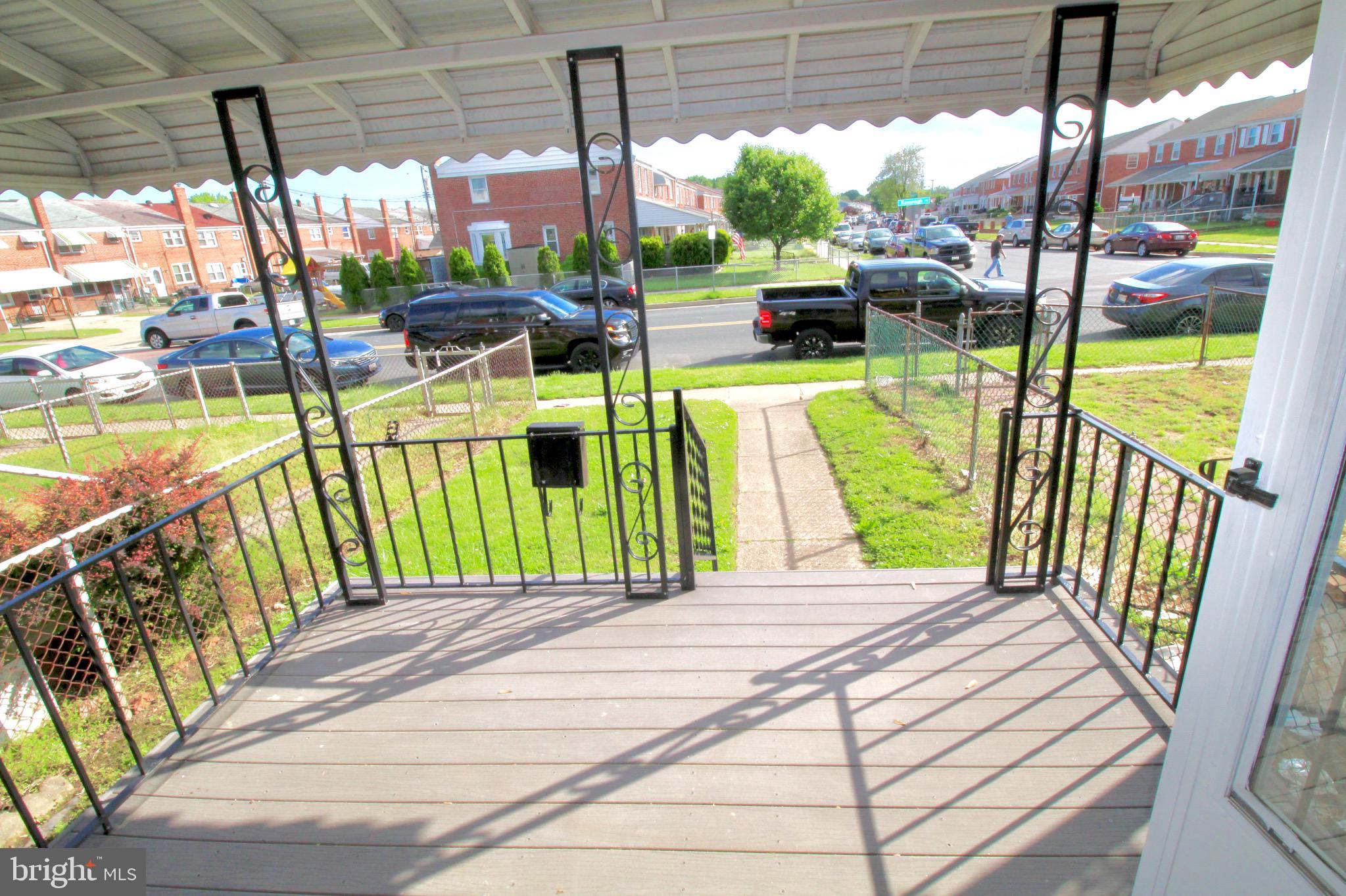 8118 Kavanagh Road Baltimore, MD 21222 - Photo 23 of 23 Treks Front Porch with awing
