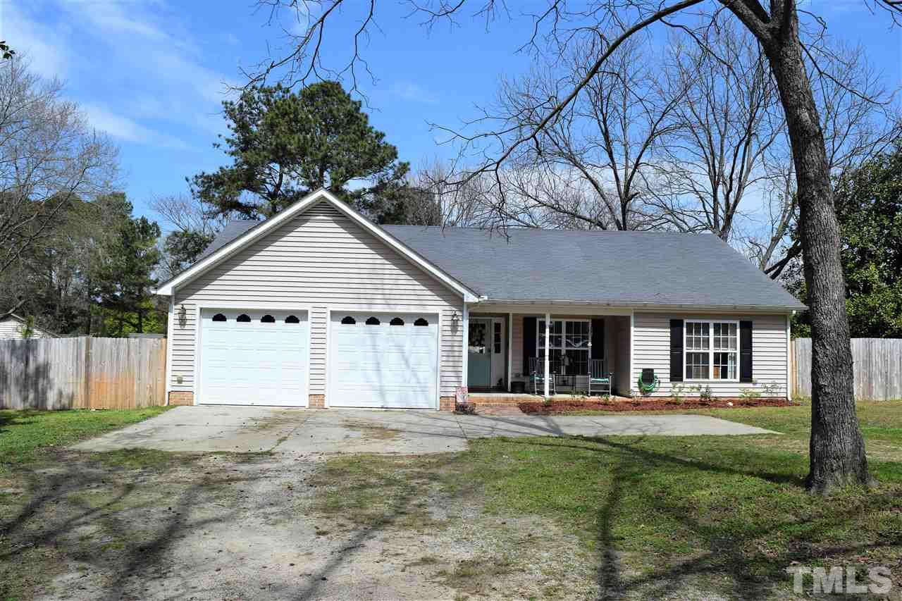 3917 Howard Circle Raleigh, NC 27604 - Photo 15 of 16 a view of a house with backyard and garden