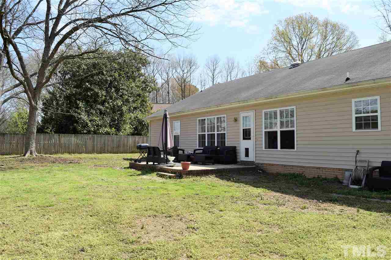 3917 Howard Circle Raleigh, NC 27604 - Photo 16 of 16 a view of a house with backyard and sitting area