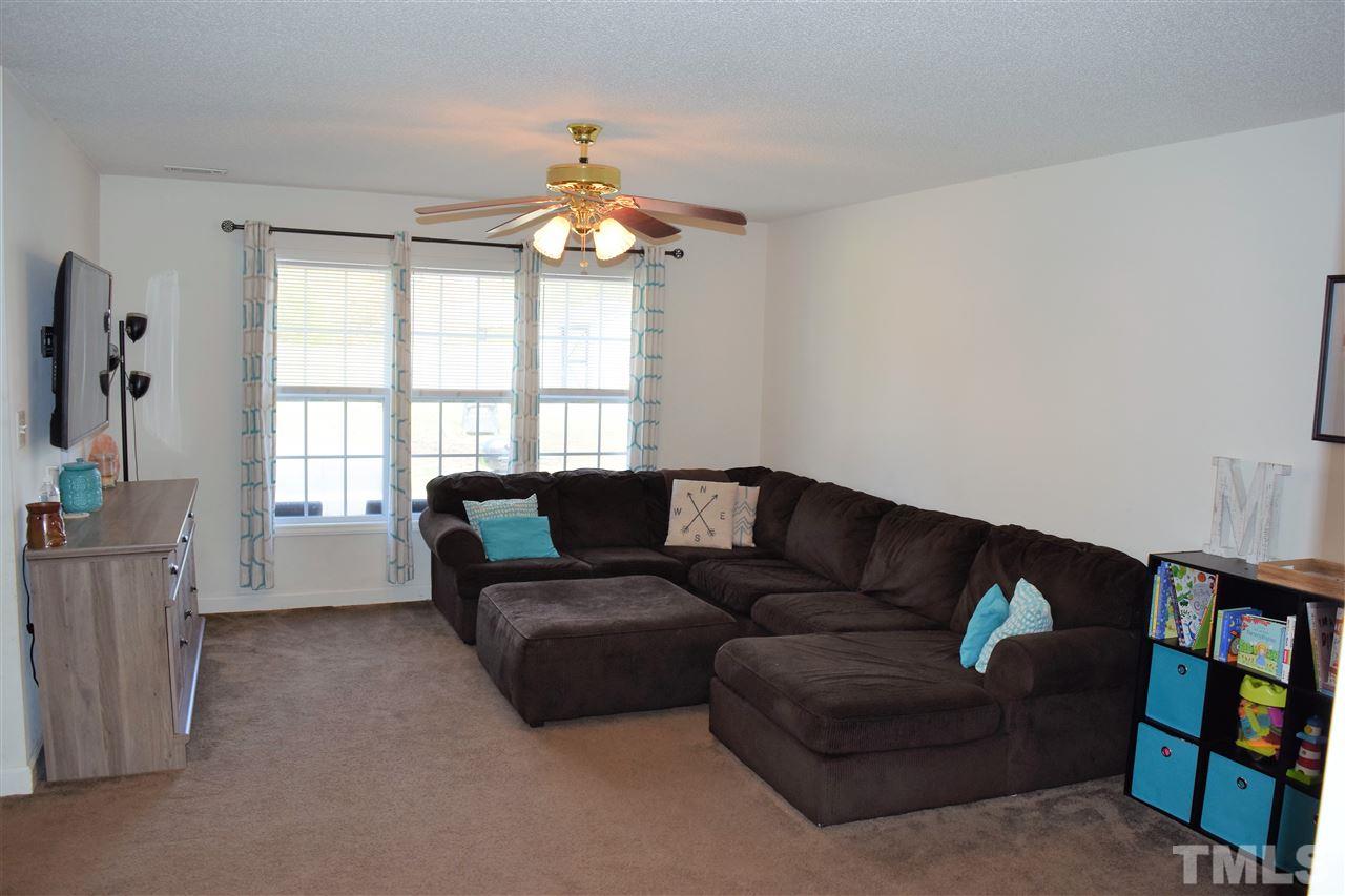 3917 Howard Circle Raleigh, NC 27604 - Photo 3 of 16 a living room with furniture and a window