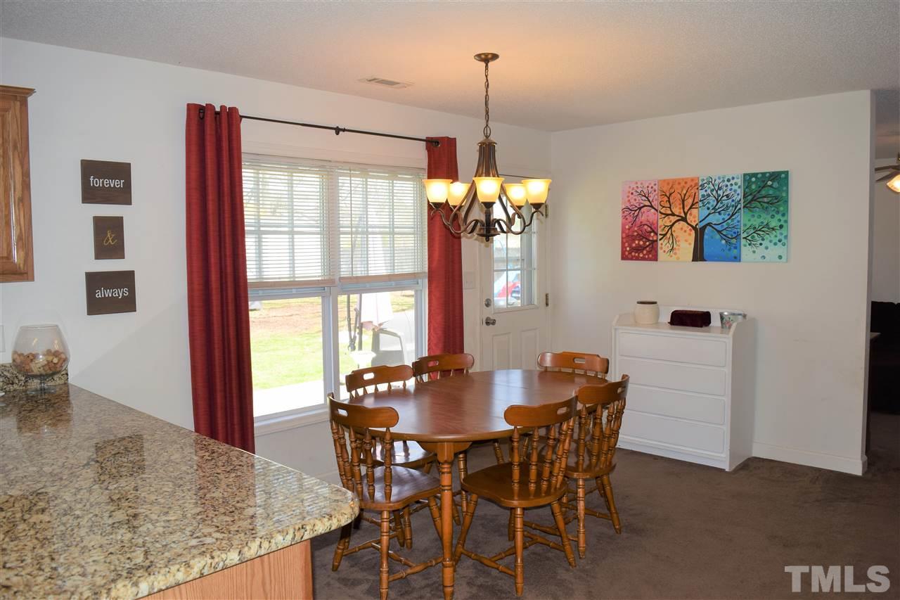 3917 Howard Circle Raleigh, NC 27604 - Photo 7 of 16 a dining room with furniture and window