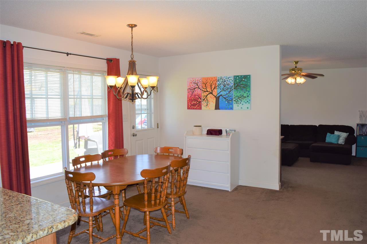 3917 Howard Circle Raleigh, NC 27604 - Photo 8 of 16 a dining room with furniture and window
