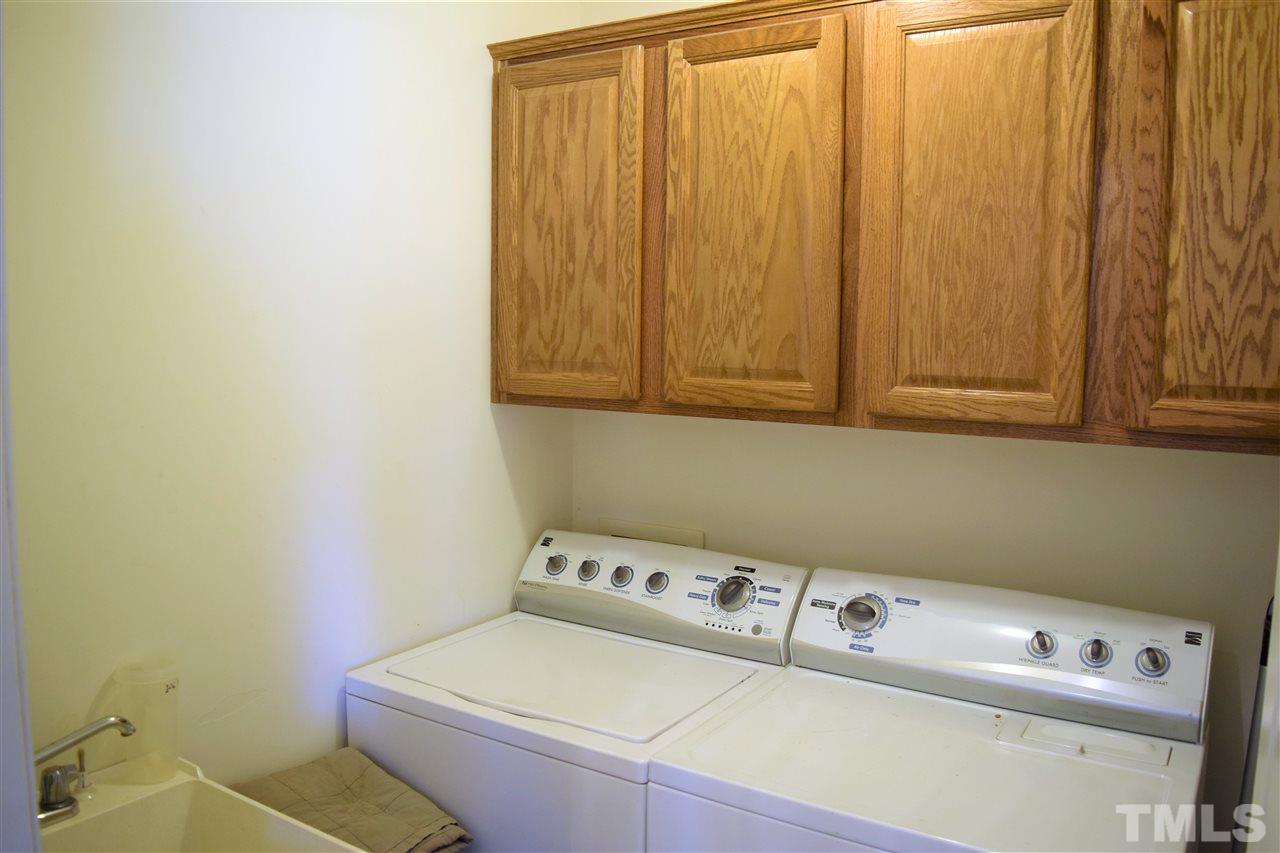 3917 Howard Circle Raleigh, NC 27604 - Photo 9 of 16 a bathroom with a sink and a toilet