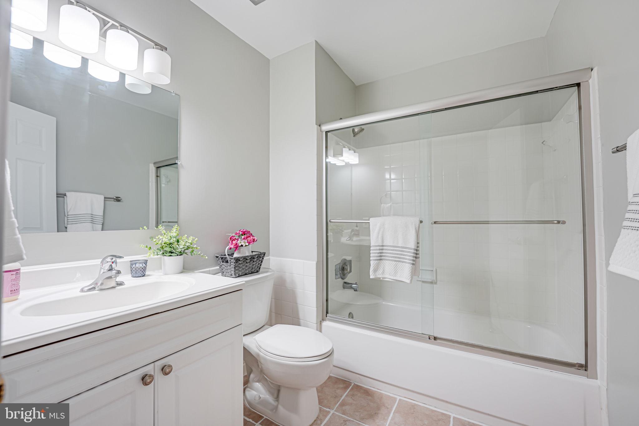 6012 Stoneygate Court Springfield, VA 22152 - Photo 23 of 36 Remodel hall bathroom-tub/shower & tile flooring