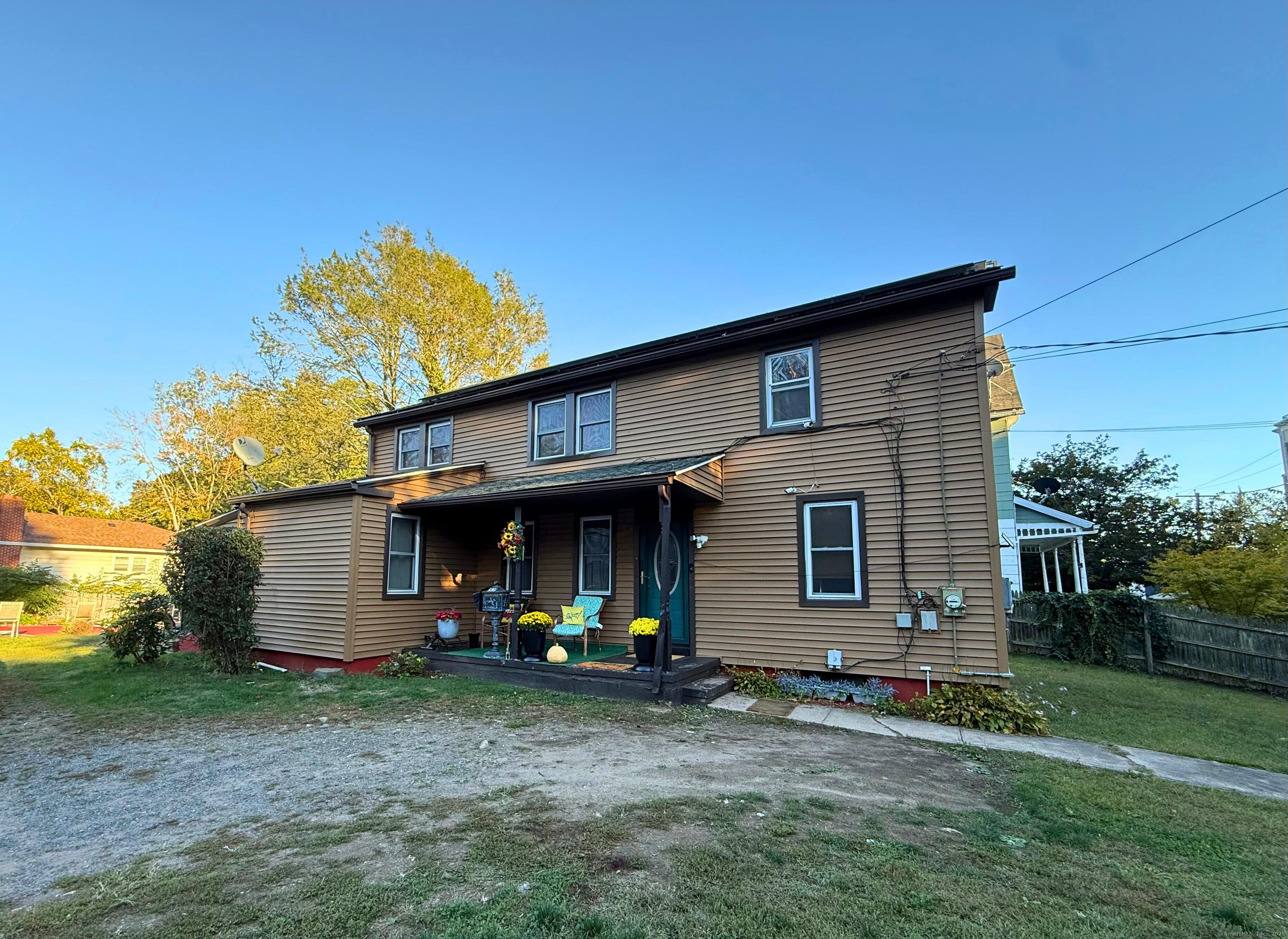57 Austin Street New Haven, CT 06515 - Photo 1 of 18 a view of a house with a backyard