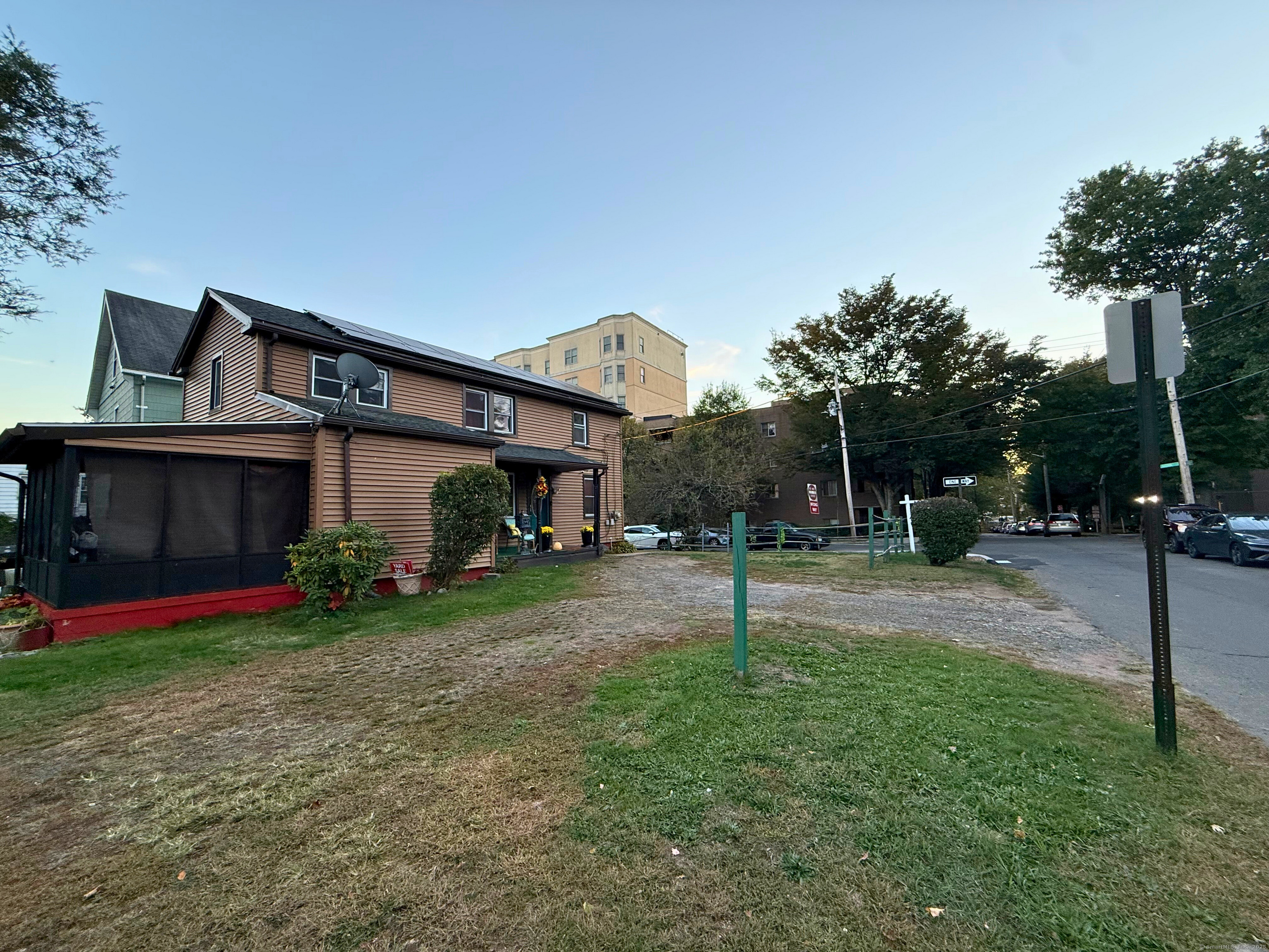 57 Austin Street New Haven, CT 06515 - Photo 17 of 18 a view of a house with a back yard