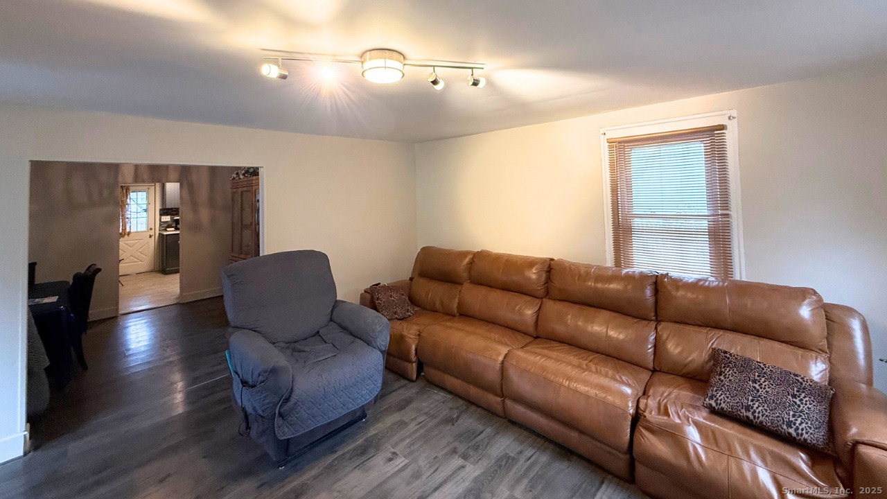 57 Austin Street New Haven, CT 06515 - Photo 9 of 18 a living room with furniture and wooden floor
