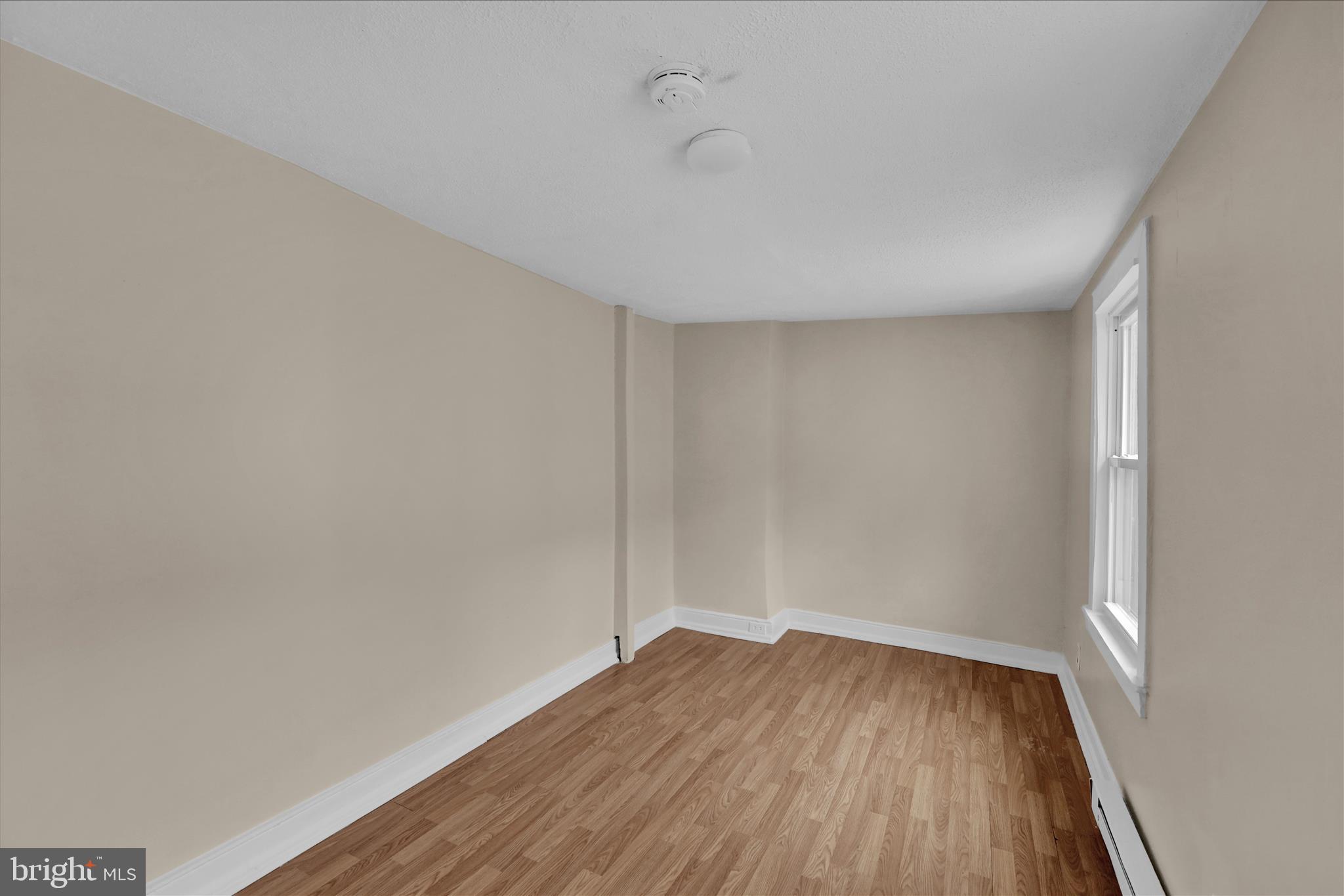 230 South 4th Street Reading, PA 19602 - Photo 16 of 26 a view of small space with wooden floor