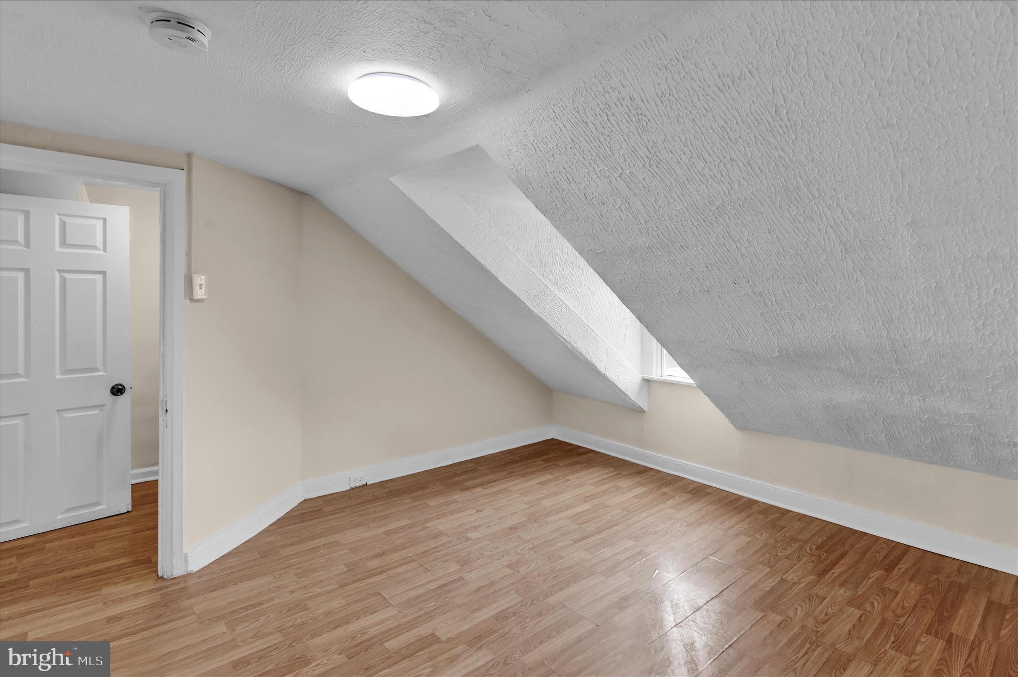 230 South 4th Street Reading, PA 19602 - Photo 20 of 26 a view of a big room with wooden floor