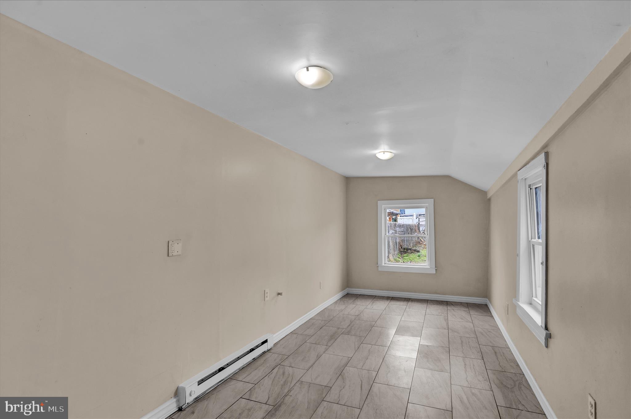 230 South 4th Street Reading, PA 19602 - Photo 7 of 26 a view of an empty room and window