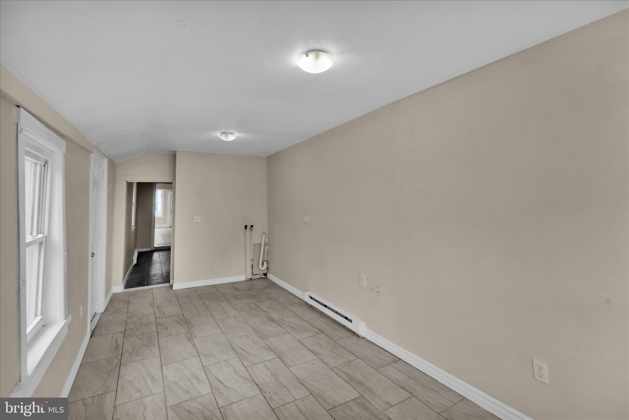 230 South 4th Street Reading, PA 19602 - Photo 8 of 26 a view of empty room with wooden floor
