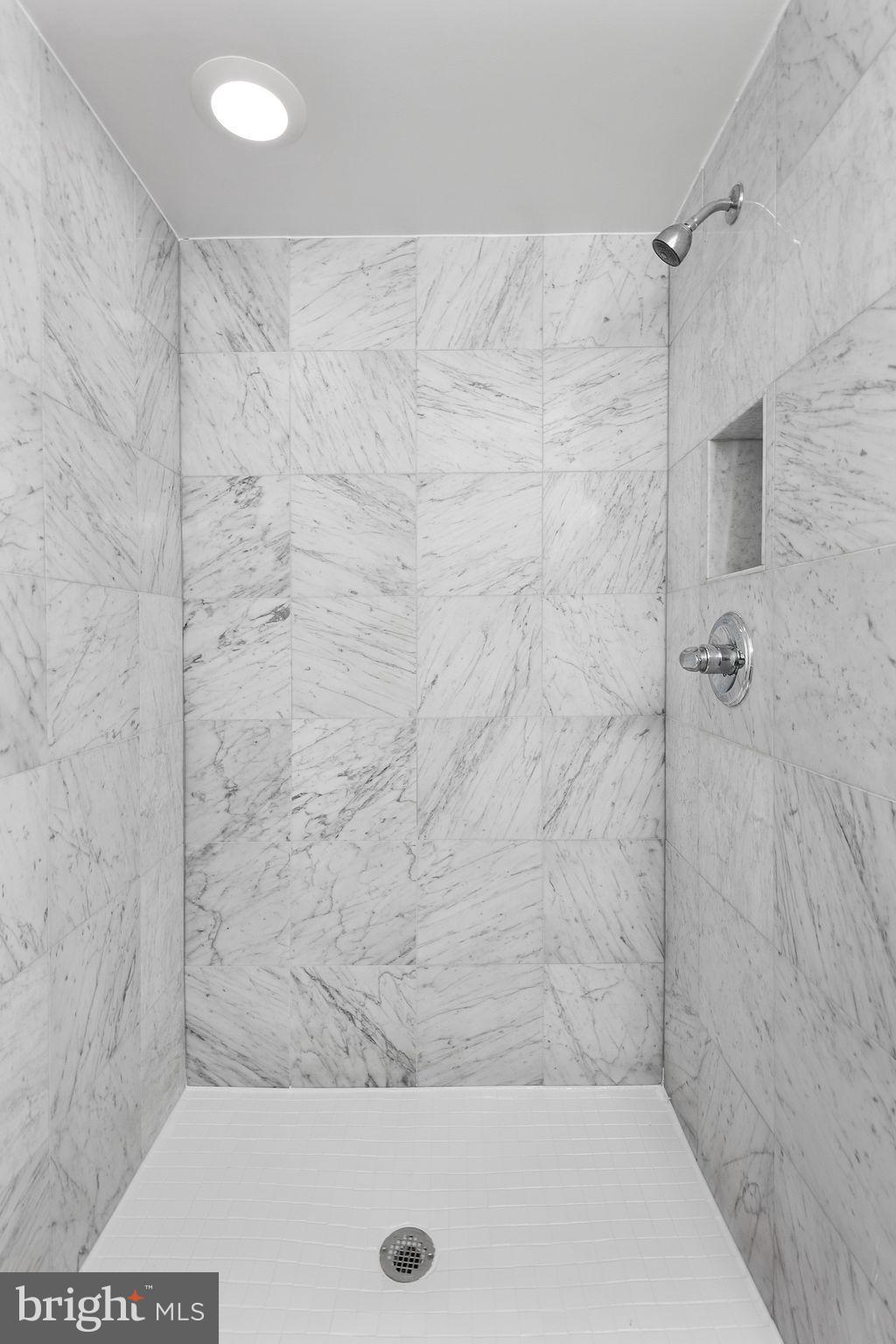 11600 Stoneview Square, Unit 60/2B Reston, VA 20191 - Photo 7 of 27 a bathroom with a shower